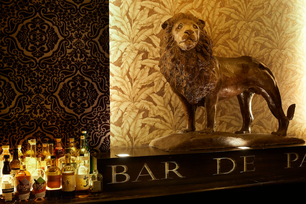 Lion Sculpture behind the bar